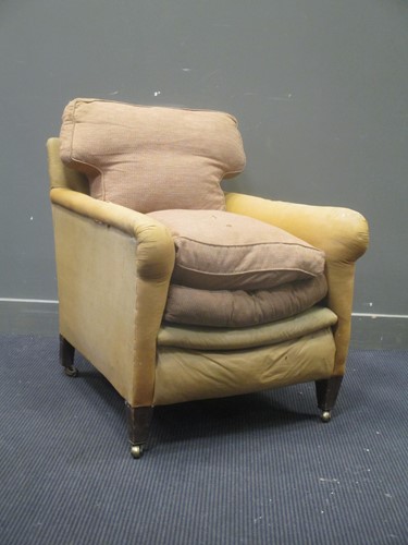 Lot 369 - A Howard type upholstered armchair