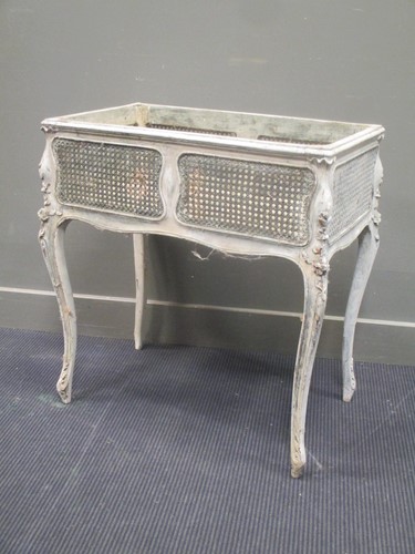 Lot 310 - An early 20th century French painted planter...