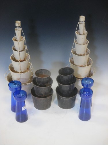Lot 89 - A colleciton of toleware flower towers, twelve...
