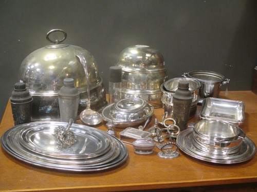 Lot 203 - A quantity of silver plated meat covers,...