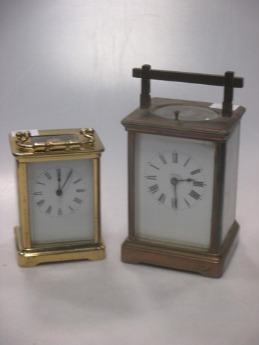 Lot 48 - An Edwardian brass carriage clock, 13cm high...