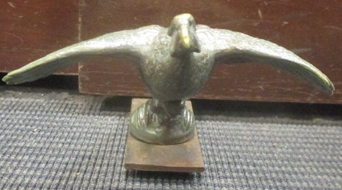 Lot 73 - A mid 20th century pheasant car mascot 19cm long