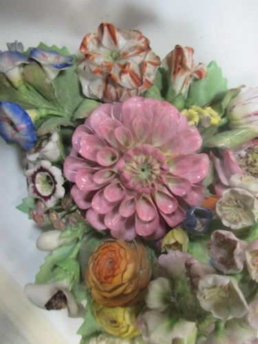 Lot 60 - A group of 19th century floral encrusted...