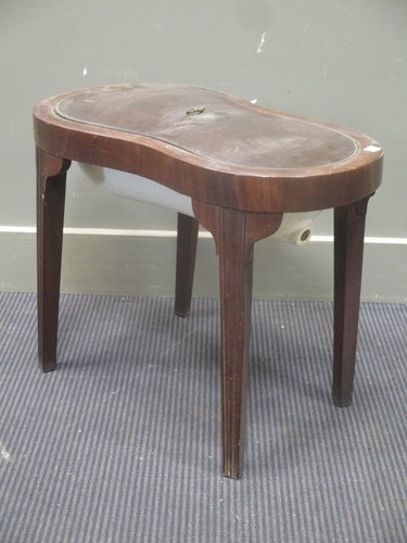 Lot 425 - A George III mahogany kidney shaped bidet...
