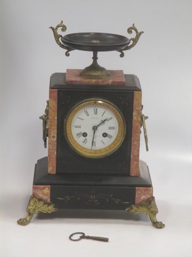 Lot 154 - A late 19th century black marble mantel clock,...