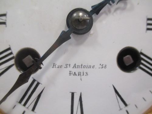 Lot 154 - A late 19th century black marble mantel clock,...