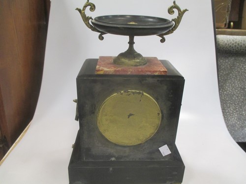 Lot 154 - A late 19th century black marble mantel clock,...