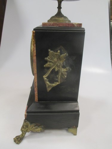 Lot 154 - A late 19th century black marble mantel clock,...