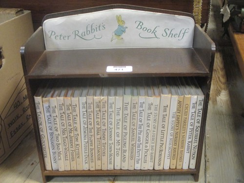 Lot 471 - Beatrix Potter, a collection of books with a...