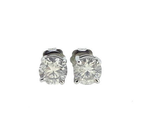 Lot 250 - A pair of single stone diamond ear studs