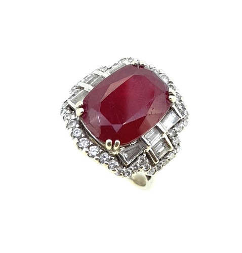 Lot 199 - An 18ct gold ruby and diamond cluster ring