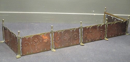 Lot 421 - An Arts & Crafts copper and brass fender...