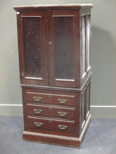 Lot 411 - An Edwardian mahogany cabinet standing on a...
