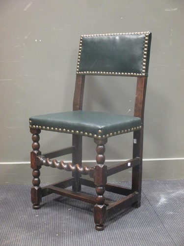 Lot 419 - A 17th century Cromwellian oak single chair,...