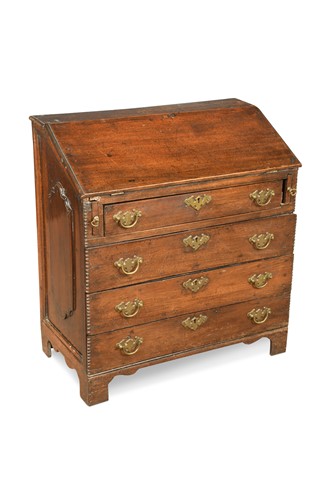 Lot 473 - A small scale oak bureau, 18th century