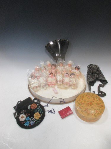 Lot 169 - A collection of miniature bisque and other...