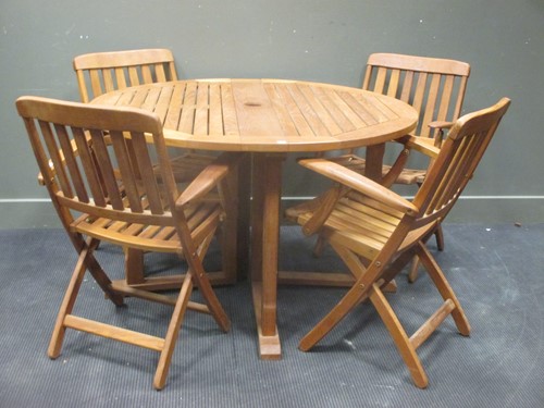 Lot 449 - A modern teak folding garden set to include a...