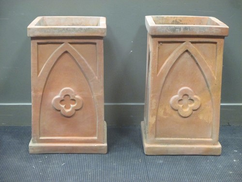 Lot 453 - A near pair of terracotta planters decorated...