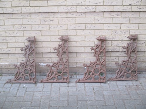 Lot 420 - Four Victorian cast and painted supports (4)