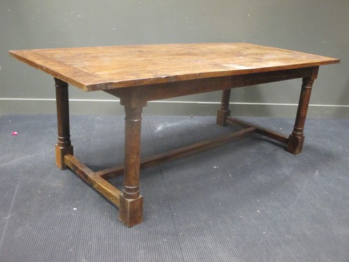 Lot 433 - A Colonial Iroko wood dining table, 76 x 213 x...