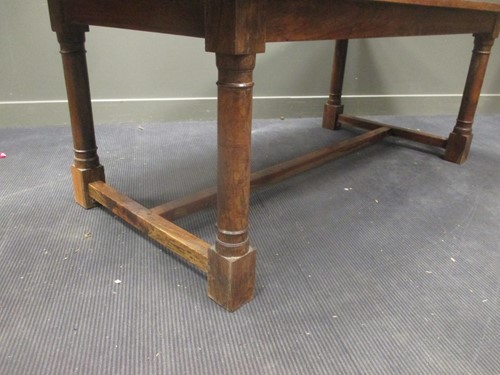 Lot 433 - A Colonial Iroko wood dining table, 76 x 213 x...