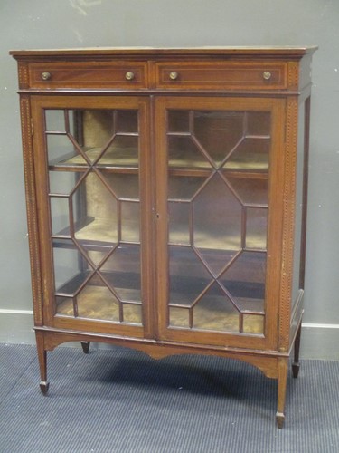 Lot 566 - An Edwardian inlaid mahogany display cabinet...