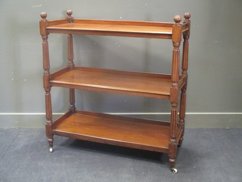 Lot 595 - A William IV, three tier mahogany buffet, 109...