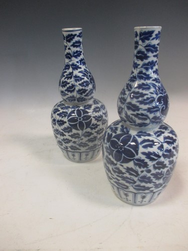 Lot 62 - A Pair of Chinese blue and white porcelain...