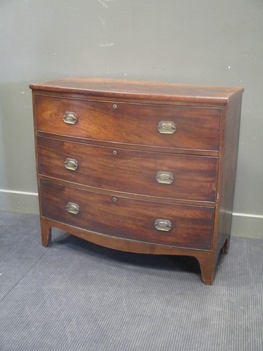 Lot 665 - A 19th century mahogany bow fronted chest of...