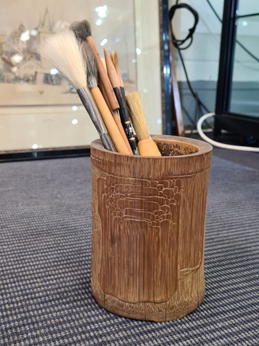 Lot 139 - A Chinese finely carved bamboo brush pot, probably late Ming/ Qing Dynasty