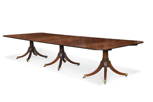 Lot 490 - A George III style mahogany dining table, 20th century