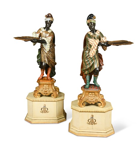 Lot 571 - A pair of polychromed Venetian Blackamoors, early 20th century