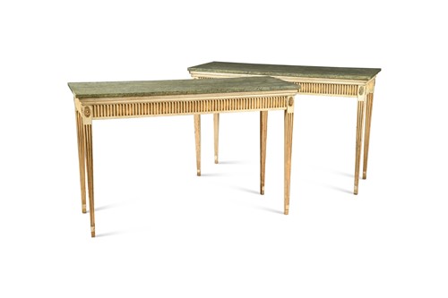 Lot 604 - A pair of grey-painted and parcel-gilt side tables, circa 1930s