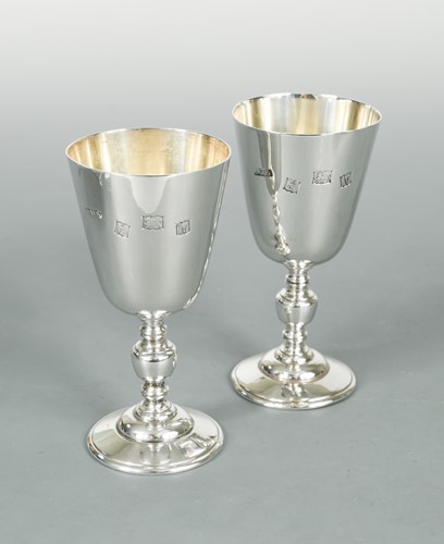 Lot 469 - A pair of 20th century silver commemorative goblets
