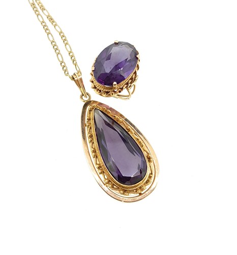 Lot 232 - A colour-change synthetic corundum pendant,...