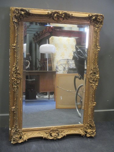 Lot 601 - A gilt gesso picture frame with bevelled...