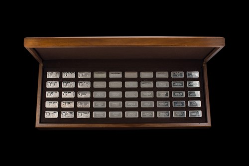 Lot 345 - 1000 Years of British Monarchy - A cased collection of fifty 20th century silver ingots