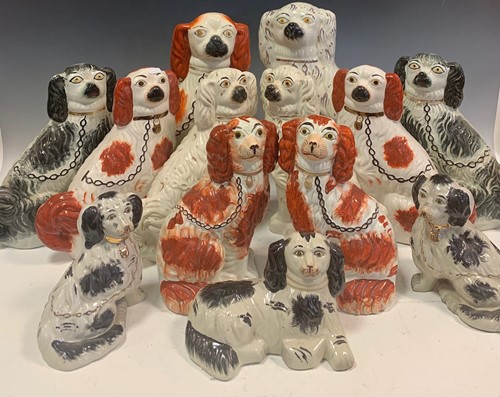 Lot 197 - A collection of Staffordshire dogs (13)