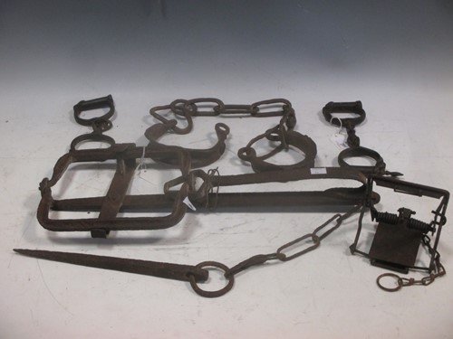 Lot 201 - Handcuffs and iron mannicles on chains