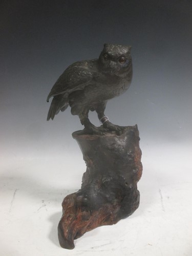 Lot 167 - A Japanese Meiji bronze model of an owl,...