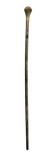 Lot 386 - A late 19th or early 20th century Rhinoceros horn walking cane