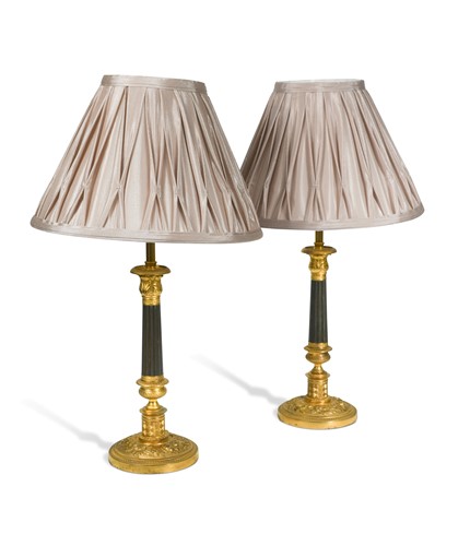 Lot 500 - A pair of Regency bronze and gilt bronze candlestick lamps