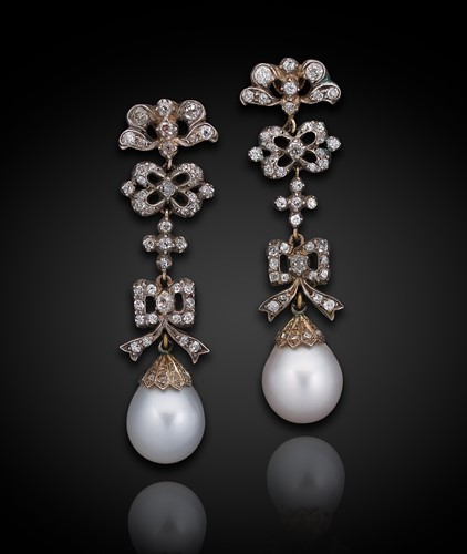 Lot 211 - A pair of Edwardian pearl and diamond ear pendants