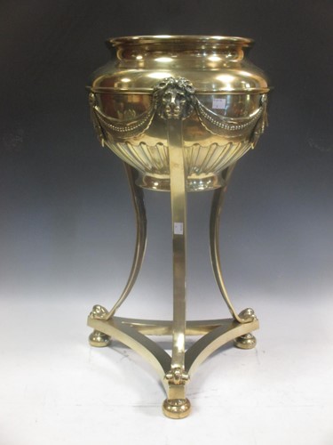 Lot 610 - A 19th century brass jardiniere, of urn form...