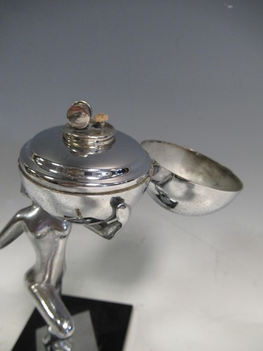 Lot 27 - An Art Deco chrome figural table lighter