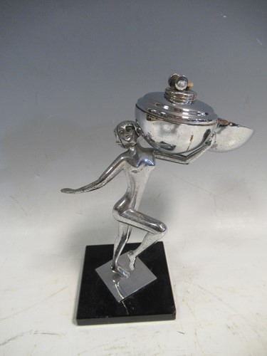 Lot 27 - An Art Deco chrome figural table lighter