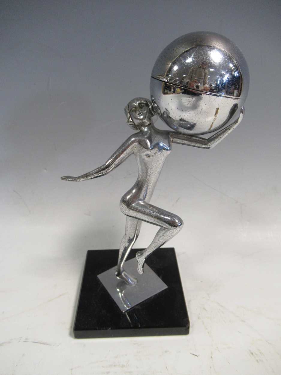 Lot 27 - An Art Deco chrome figural table lighter