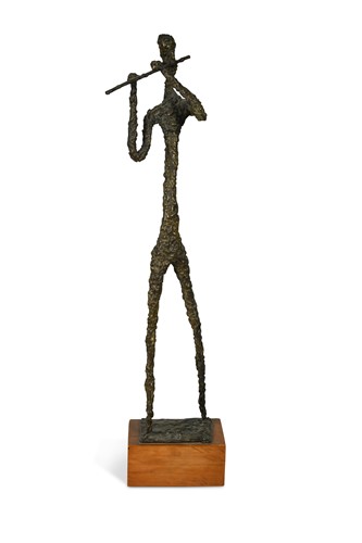 Lot 116 - A Giacometti style bronze figure of a musician
