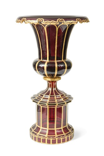Lot 426 - A Bohemian red glass pedestal urn, 19th century