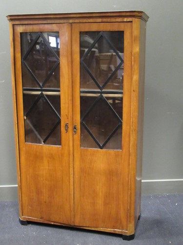 Lot 517 - A two door Biedermeier book case, 163 x 99.5 x...